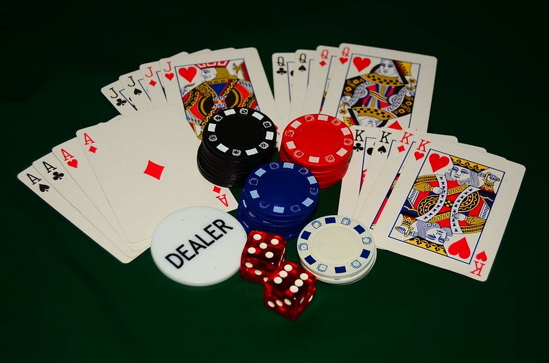 poker chips, cards, felt table