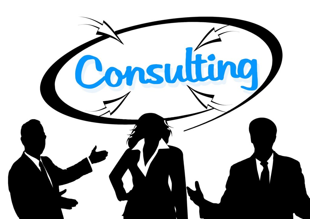 Silhouette Image of 3 Business people with the word  consulting above them