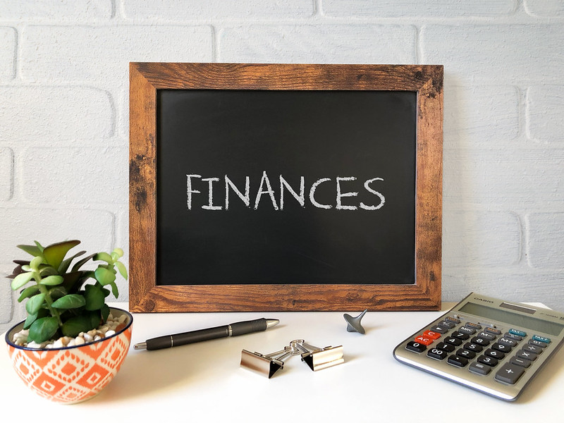 Finances Written On A Chalkboard